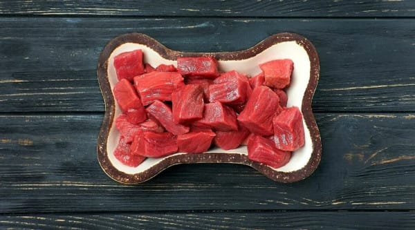 Raw beef meat in bowl.